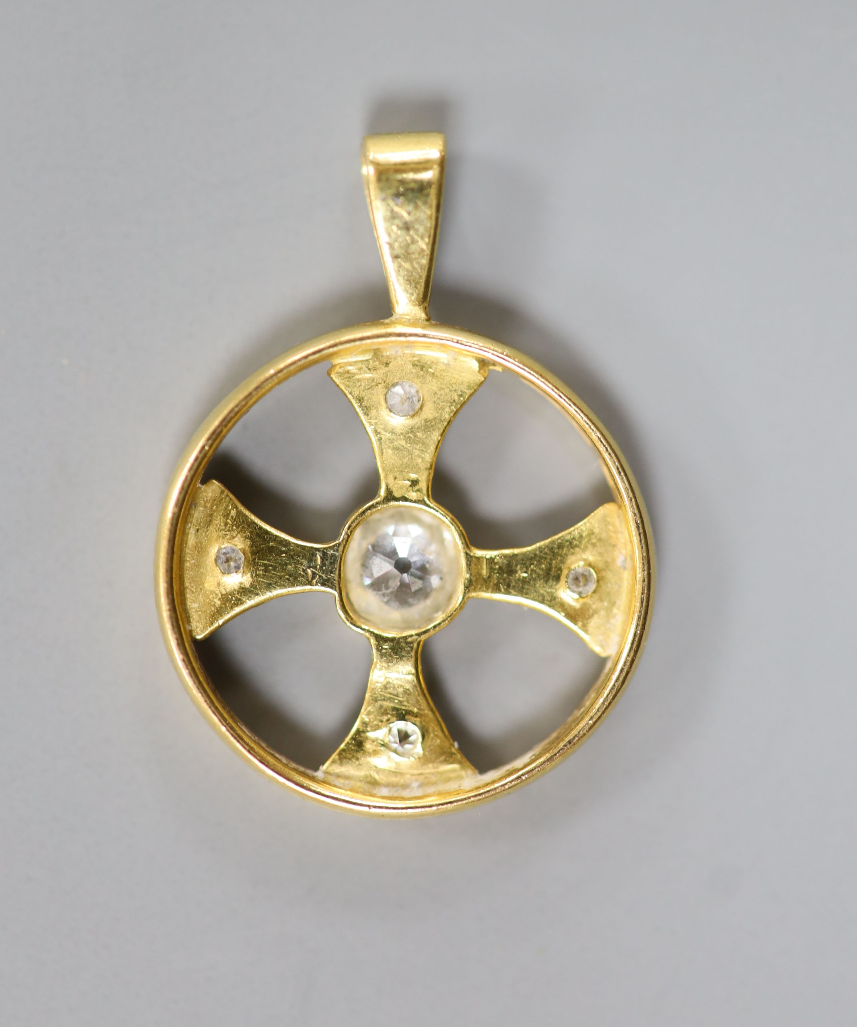 A 22ct gold and diamond set circular pendant (converted wedding band), overall 25mm, gross weight 3.6 grams